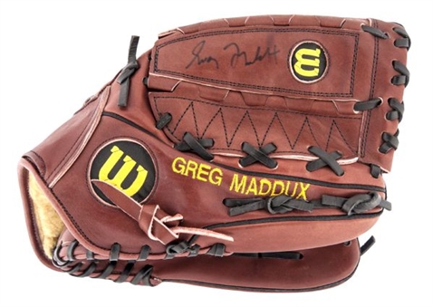 Greg Maddux Game Issued and Signed Wilson Fielders Glove (PSA/DNA)